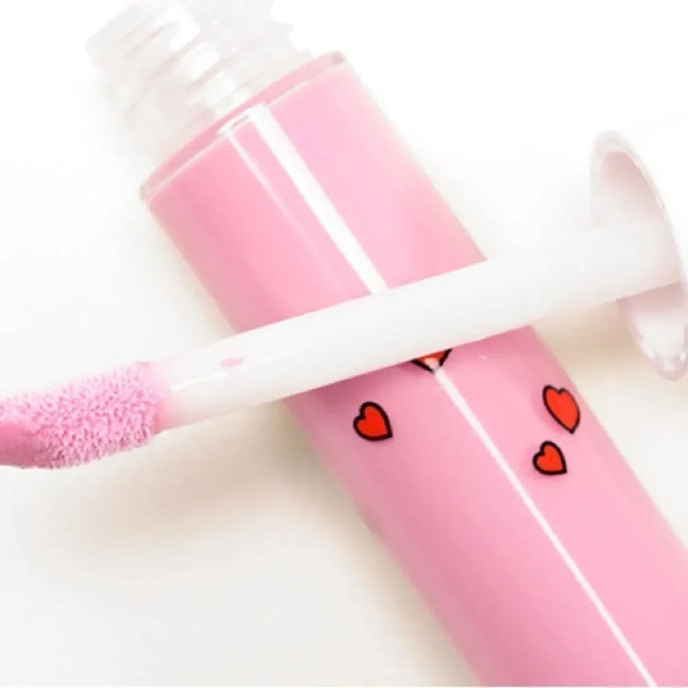 NIB MAC Archie’s Girls Lipglass in “Stay Sweet”